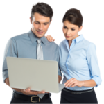 Young male and female business professionals standing next to each other and looking at something on a laptop