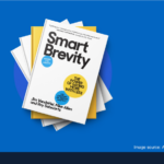 Smart Brevity book on top of a stack of books on a blue background
